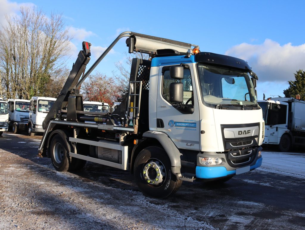 Front offside of a DAF LF 260 fitted with AJK SLK12-T Skip Loader body