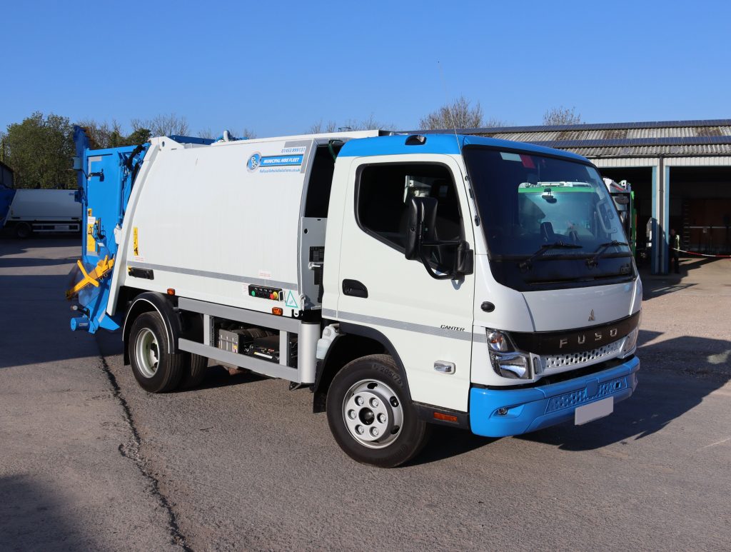 Front offside of a Mitsubishi Fuso Canter fitted with NTM K-Midi body and Trade lift