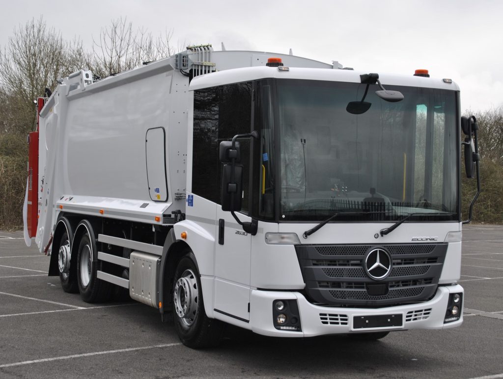 Front offside of an RVS Hire Mercedes fitted with Dennis Olympus body and Beta 2 Trade lift